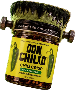 A jar of Don Chilio Spicy Jalapeño Chili Crisp dressed as Frankenstein's monster